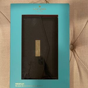 Kate Spade Black and Gold Wristlet